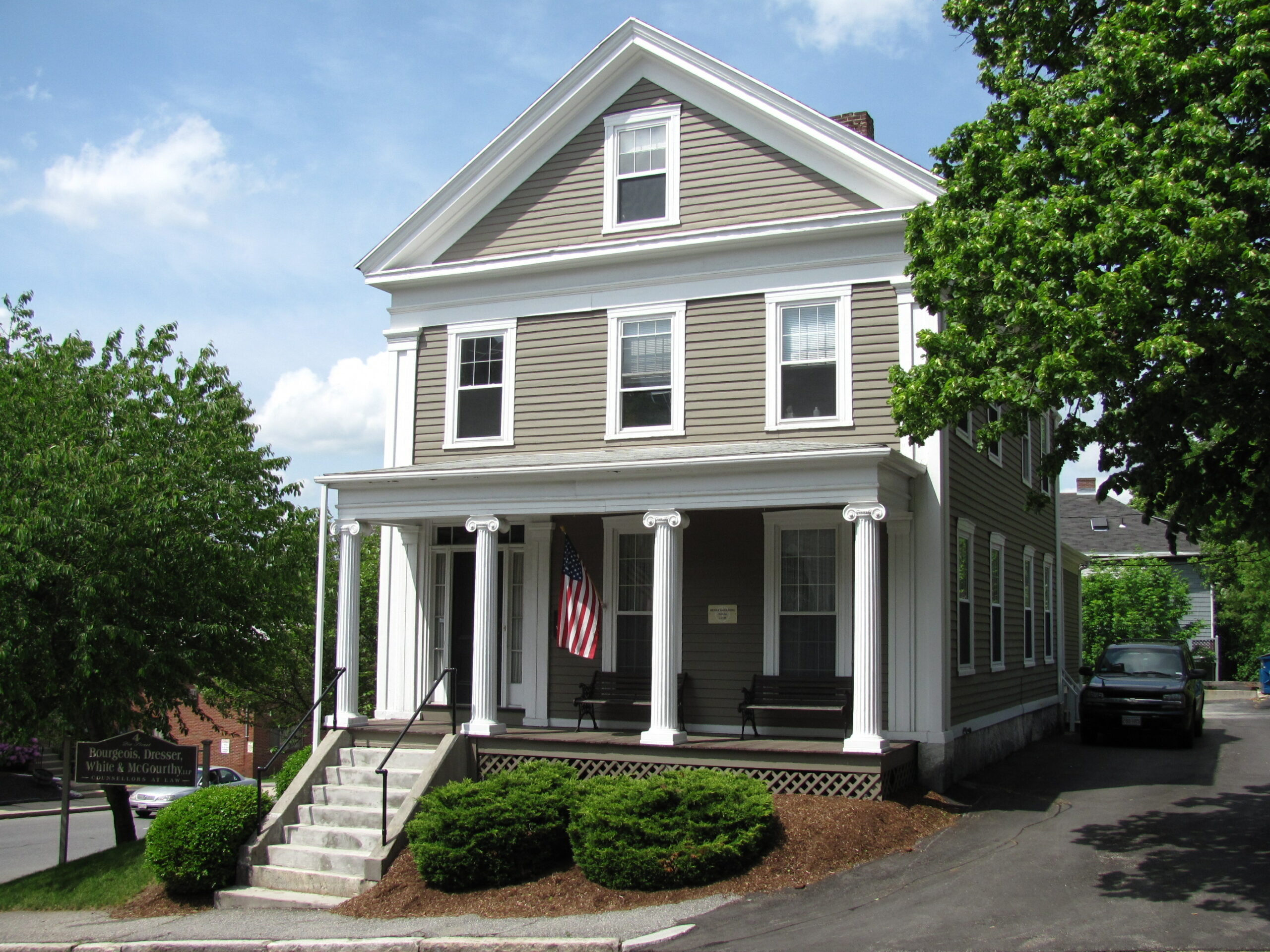 house with white and grey tan exterior painting