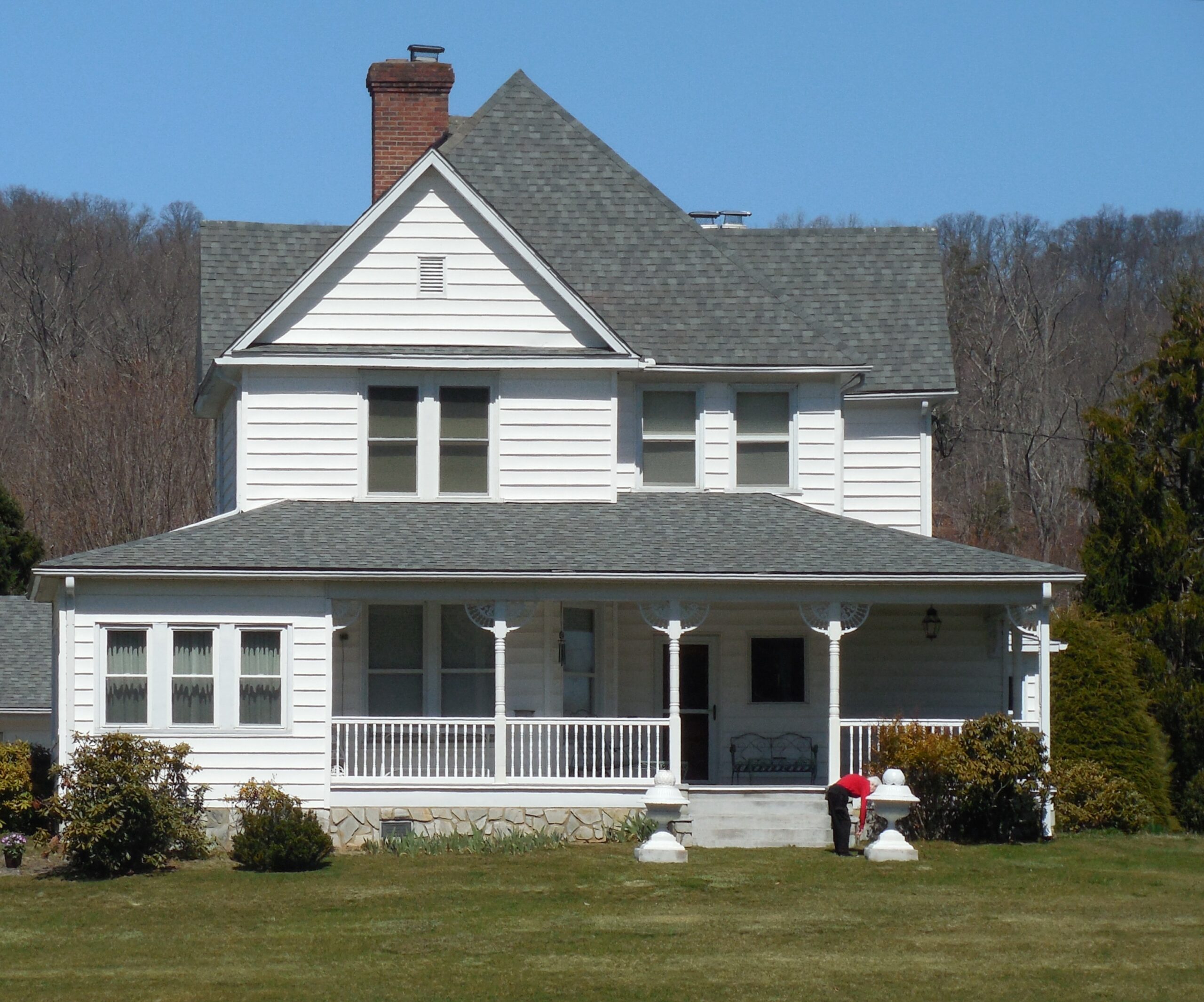 exterior house painting tan and dark shudders siding painting