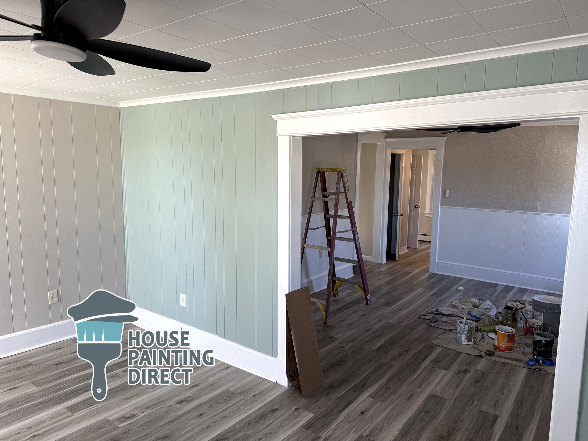 interior residential home house painting with supplies on floor